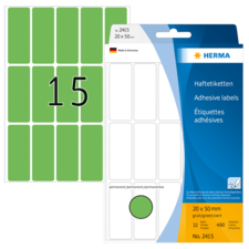 Grüne Haftetiketten auf einem Blisterpack, mit der Aufschrift "15" und Informationen zu Größe und Anzahl der Etiketten.