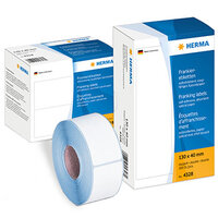 Envases grandes y pequeños de etiquetas de franqueo