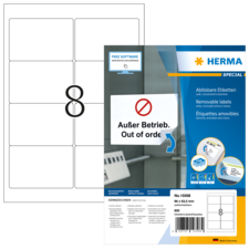 Ablösbare Etiketten auf einem Blatt, mit der Aufschrift "Außer Betrieb. Out of order." und Informationen zur Verwendung.