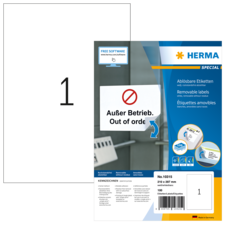 Ein Blatt mit der Nummer 1 und eine Verpackung für ablösbare Etiketten von Herma, die den Hinweis "Außer Betrieb" enthält.